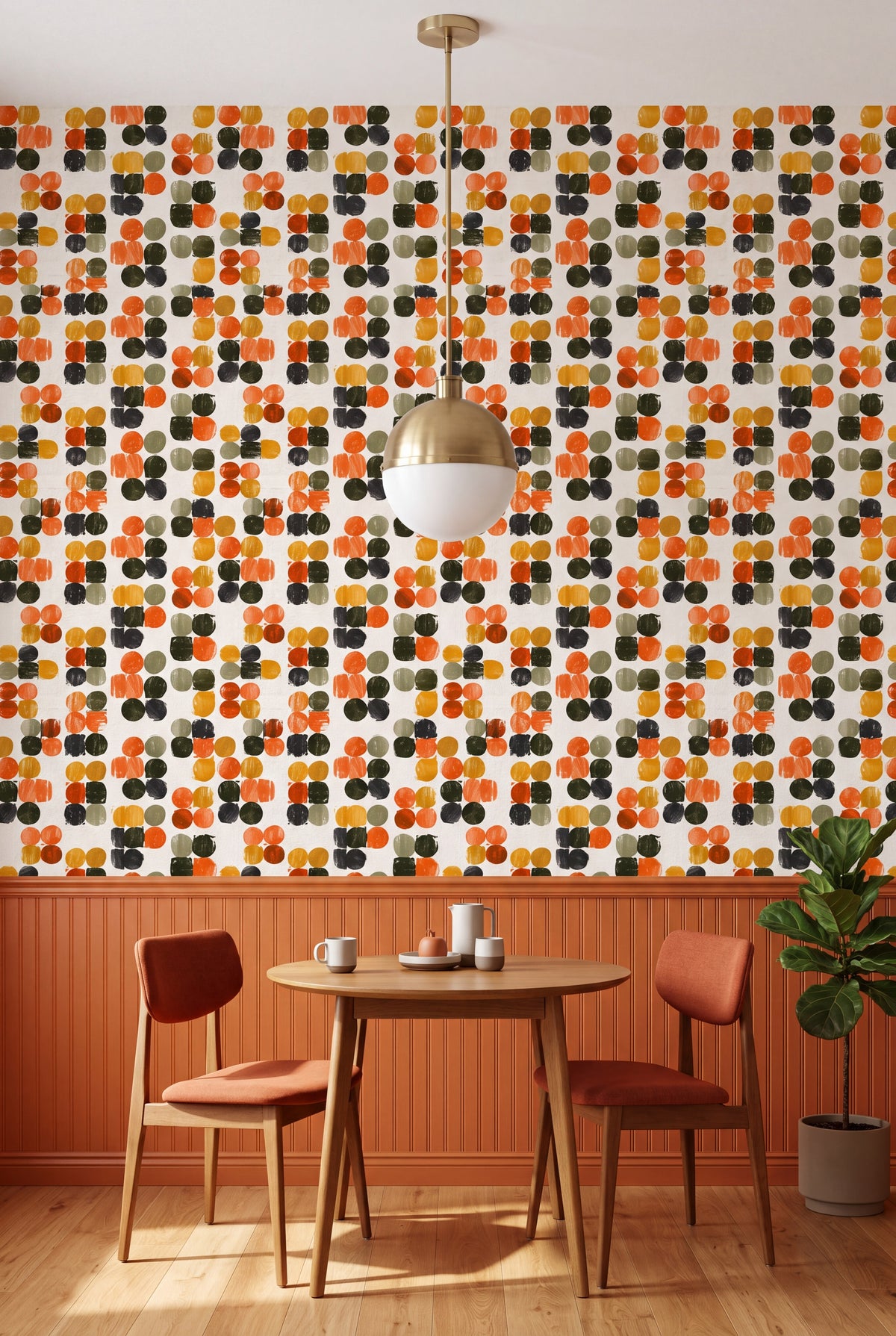 Orange and mustard block printed dot wallpaper on a cream ground in a kitchen.