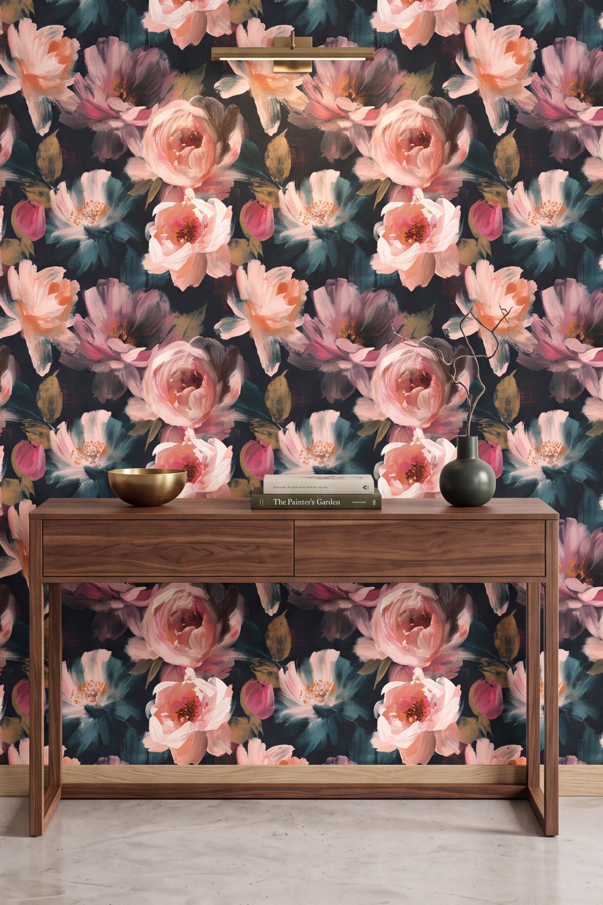 Blush roses and peonies with teal leaves on navy floral wallpaper on an accent wall.