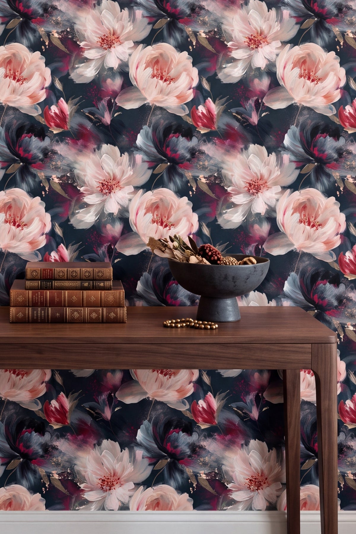 White and blush peonies on a near black floral wallpaper on an accent wall.