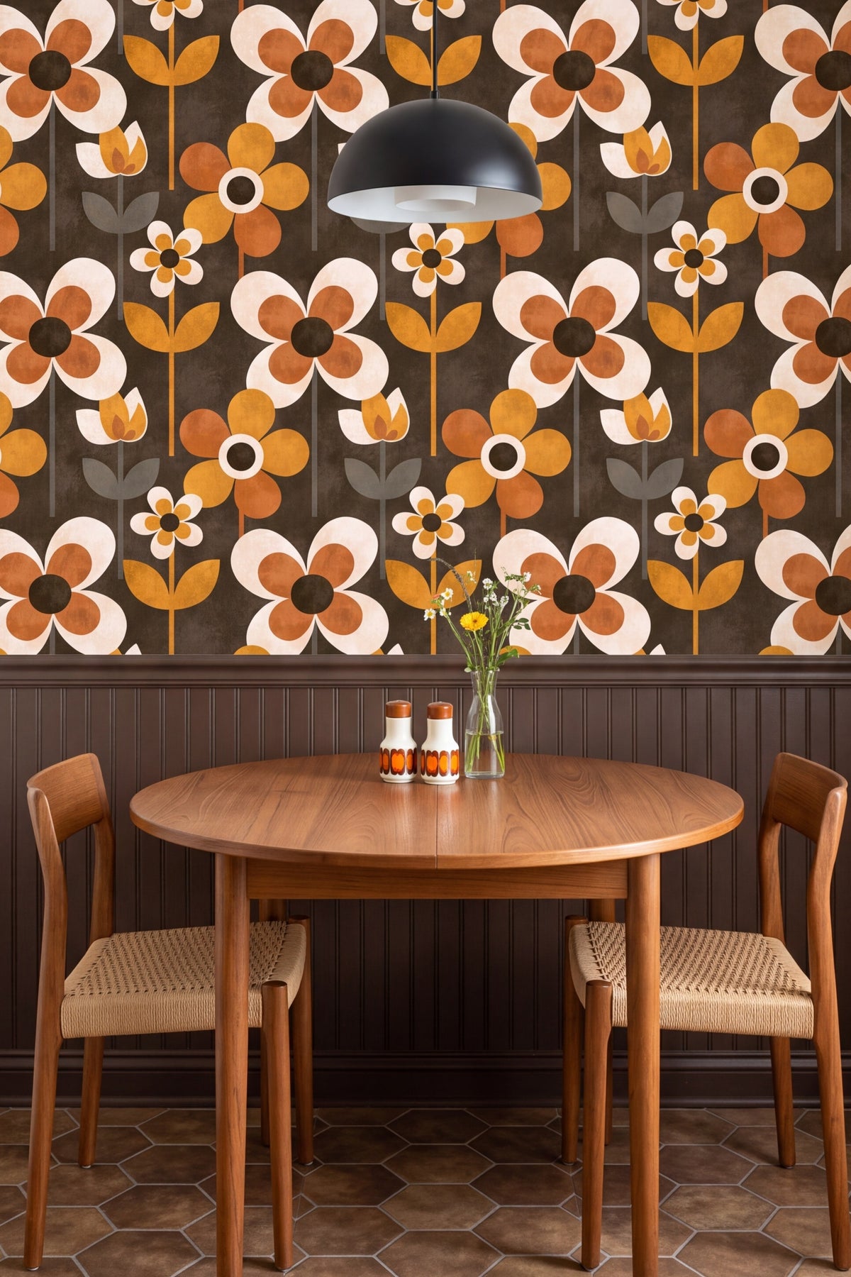 Toffee orange and cream mod daisies on dark cocoa wallpaper in a kitchen.