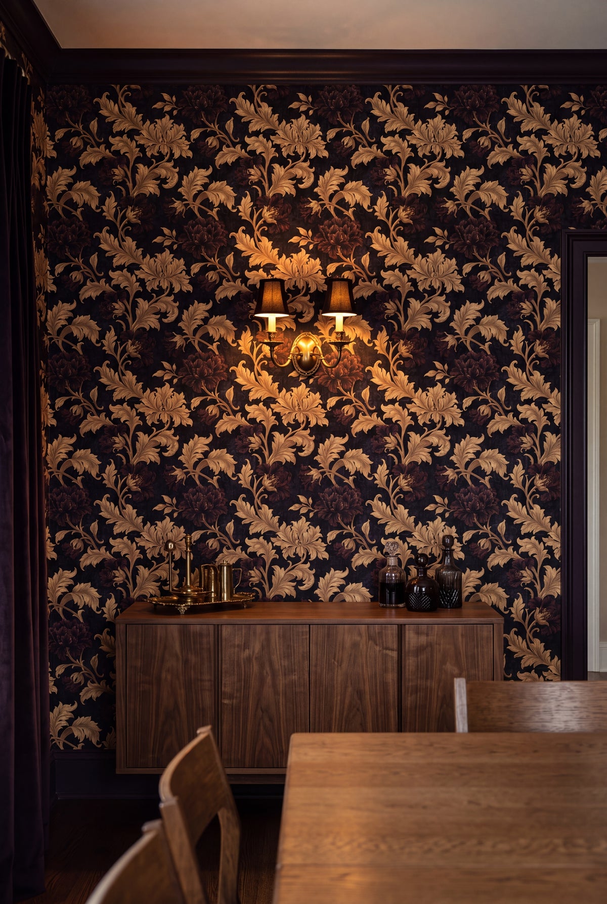 Regency Gilt wallpaper in gold and aubergine on a dining wall.