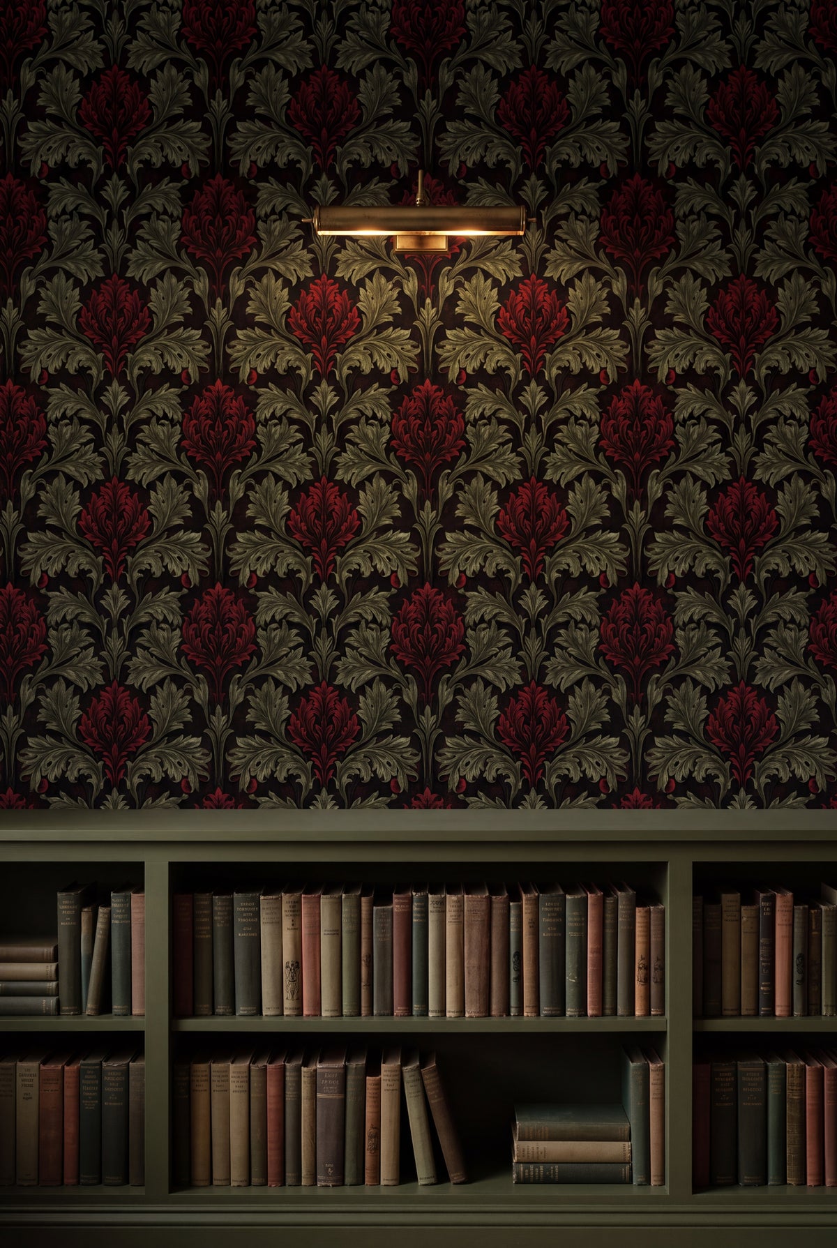 Moss Artichoke wallpaper in crimson, moss and black on a library wall.