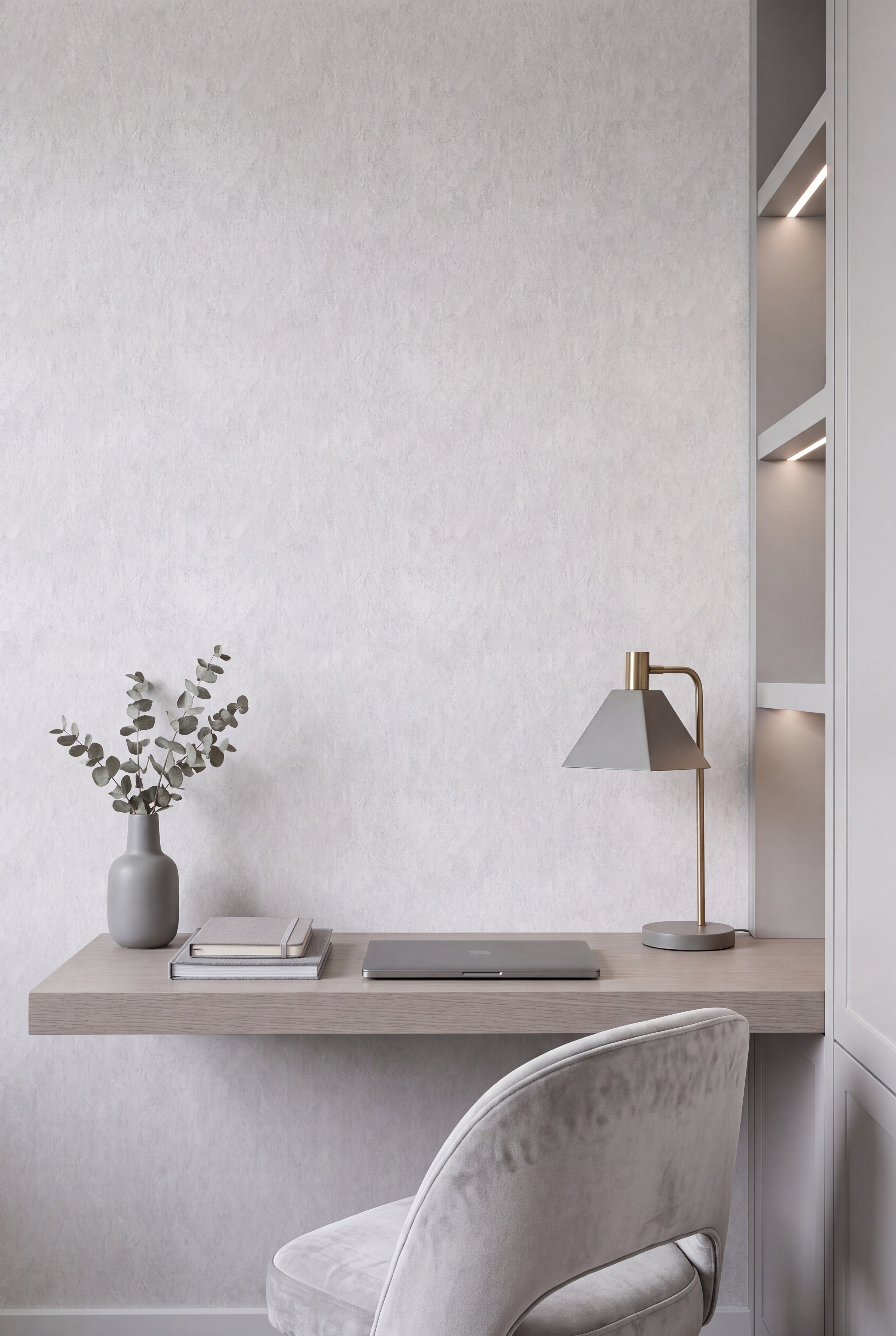 Soft light gray limewash texture wallpaper in a home office.