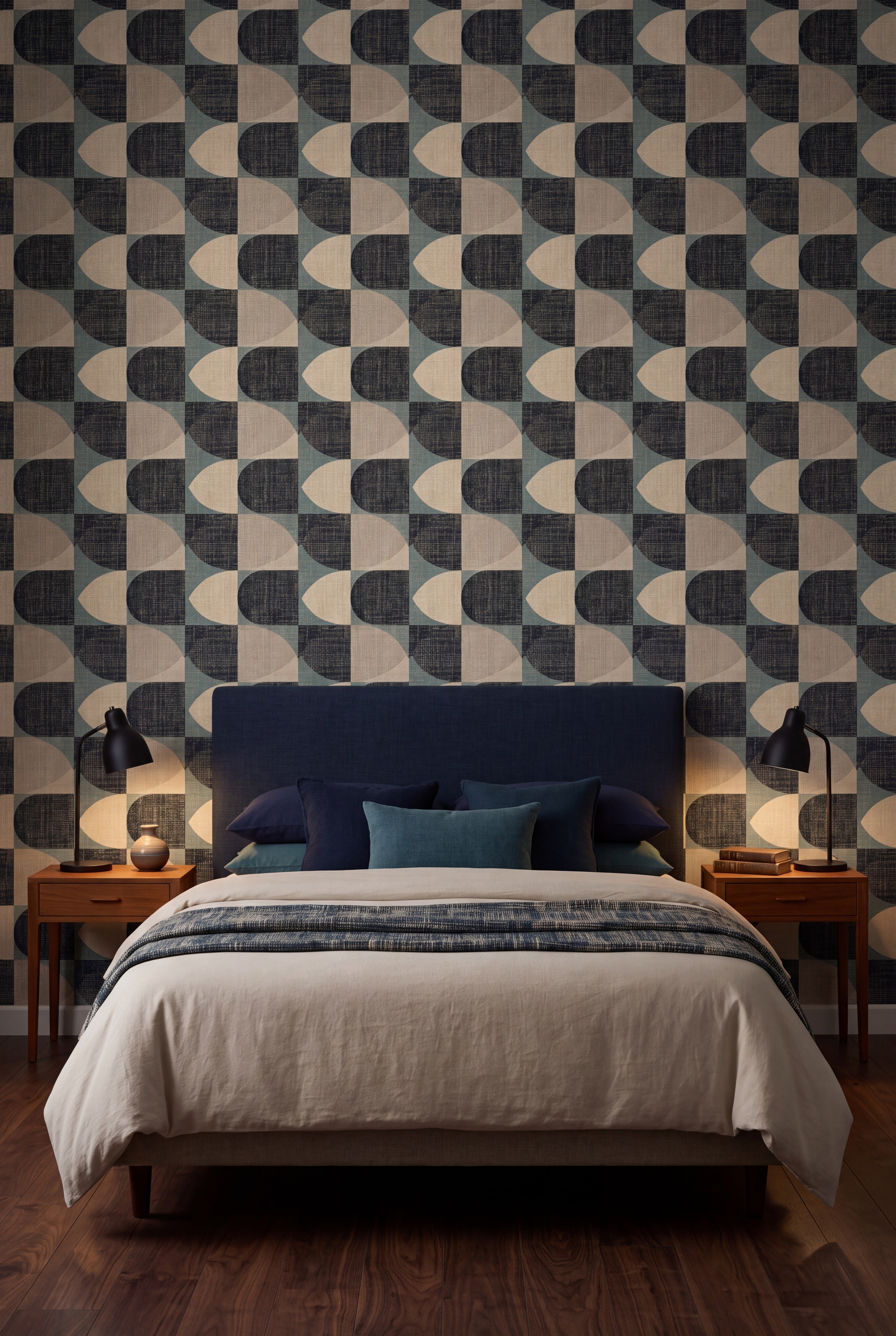 Tidewater Arc wallpaper in navy, teal and cream on a bedroom wall.