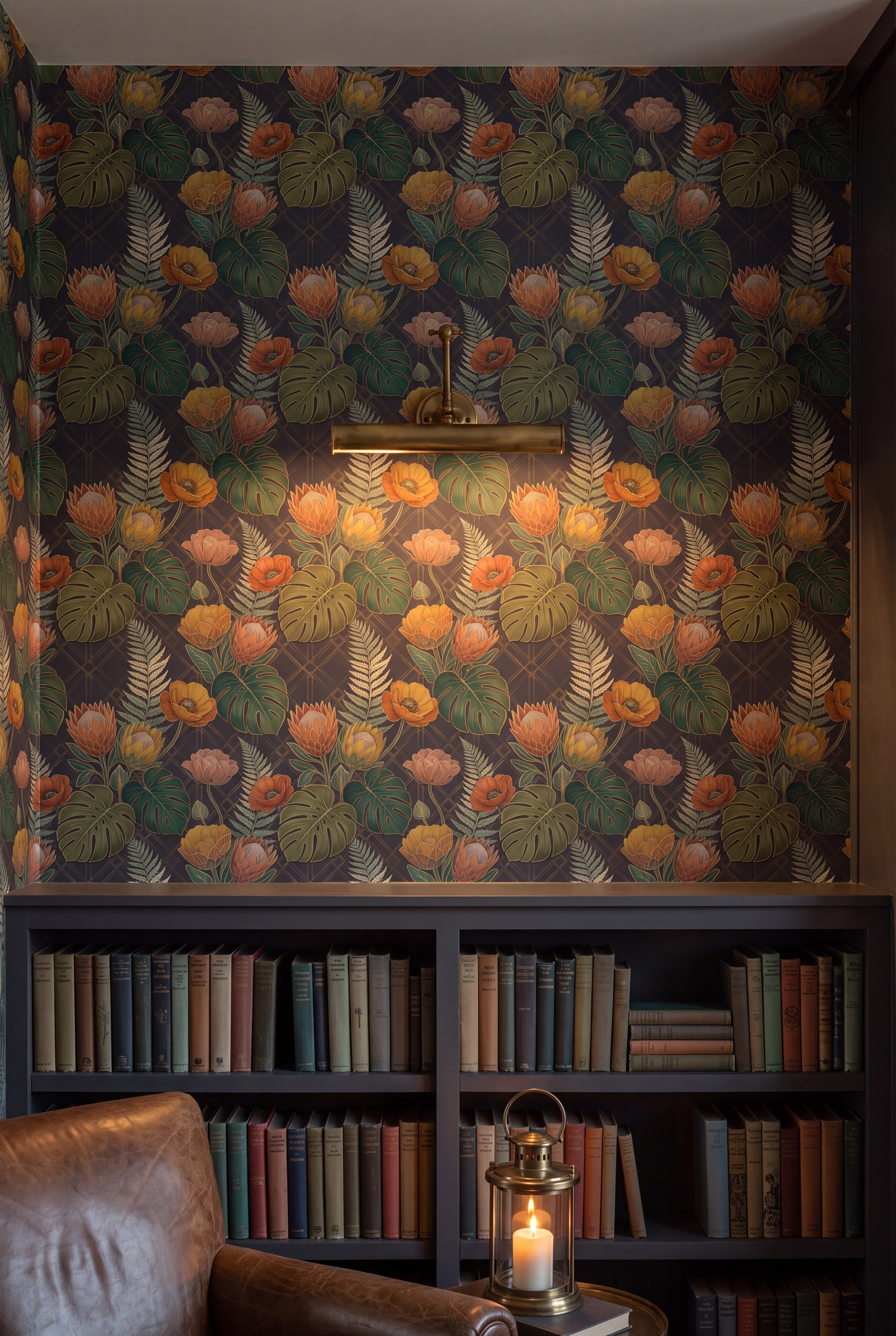 Protea Nocturne wallpaper in orange, protea pink and gold on charcoal on a library wall.