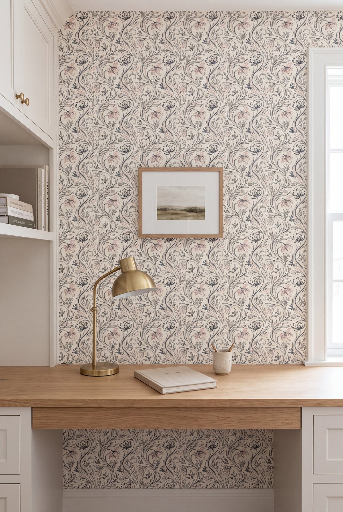 Pencil Botanical wallpaper in sage and blush line on white on a study wall.
