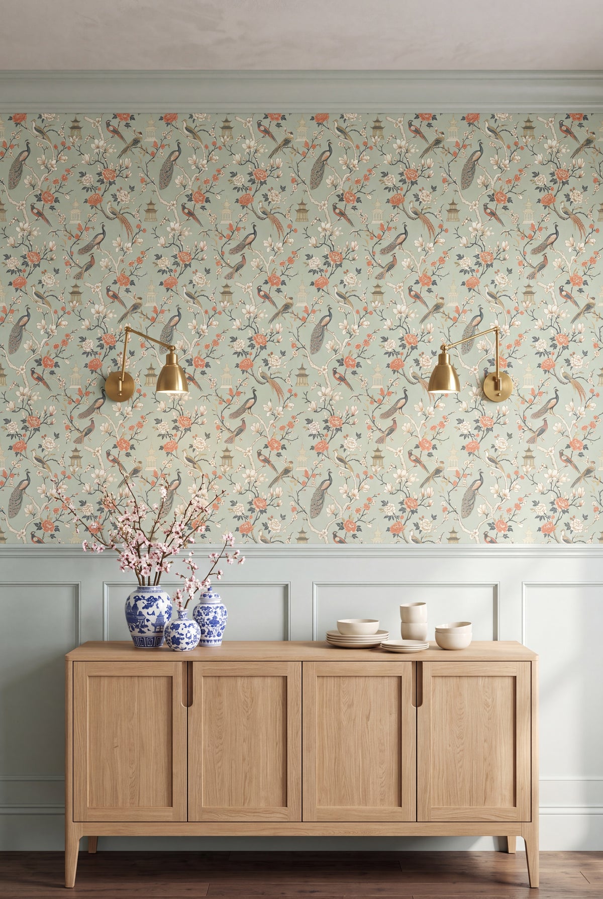 Celadon Aviary wallpaper in celadon, coral and cream on a dining wall.