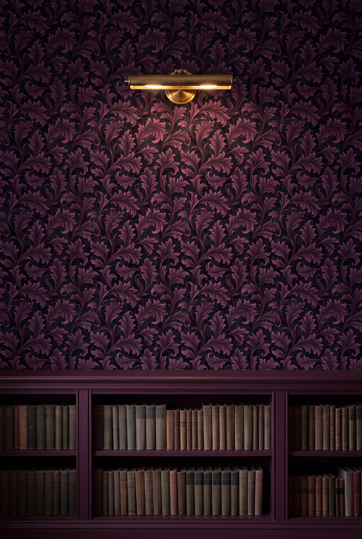 Plum Frond wallpaper shown in a library