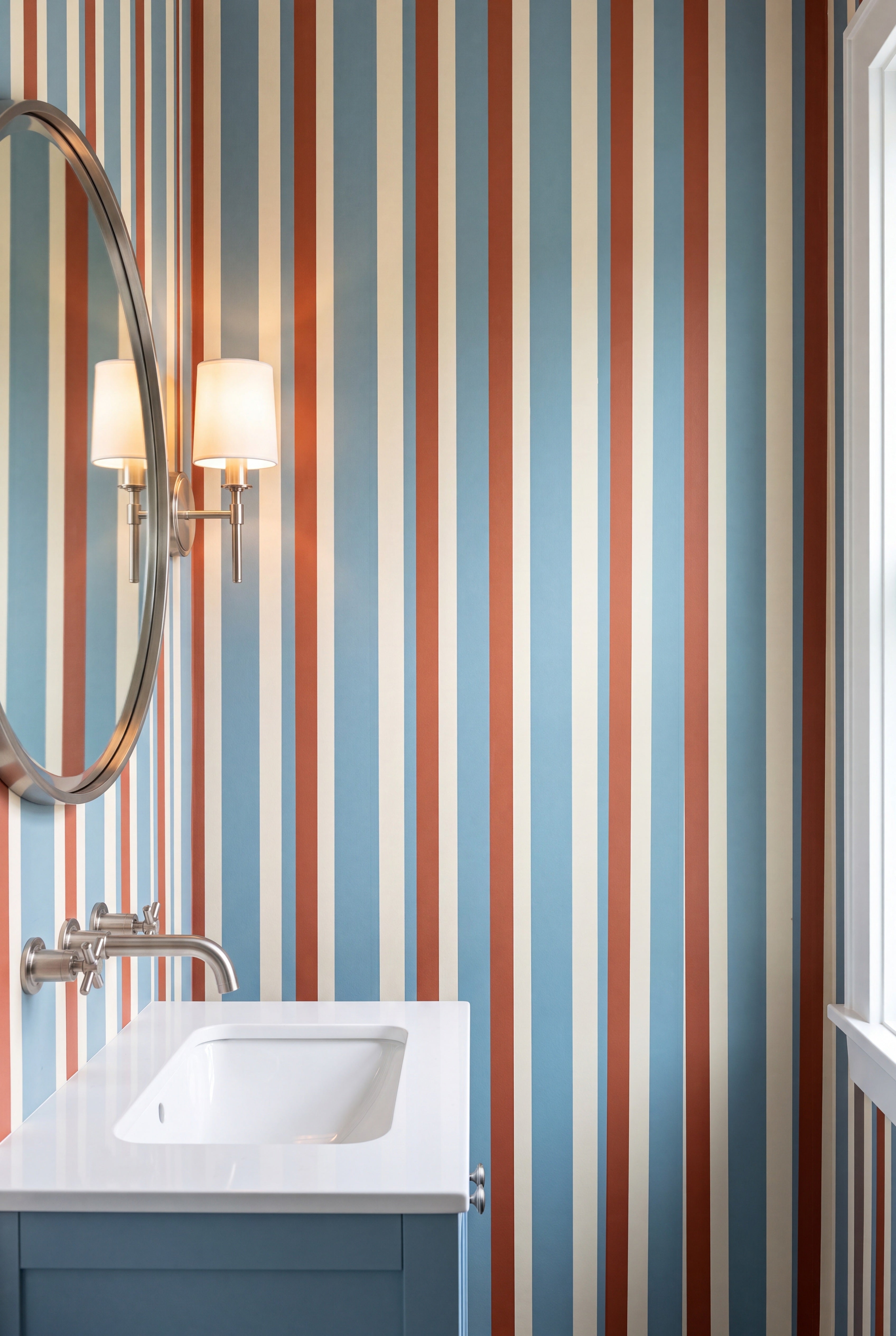 Horizontal cream, brown, and sage stripe wallpaper in a powder room.