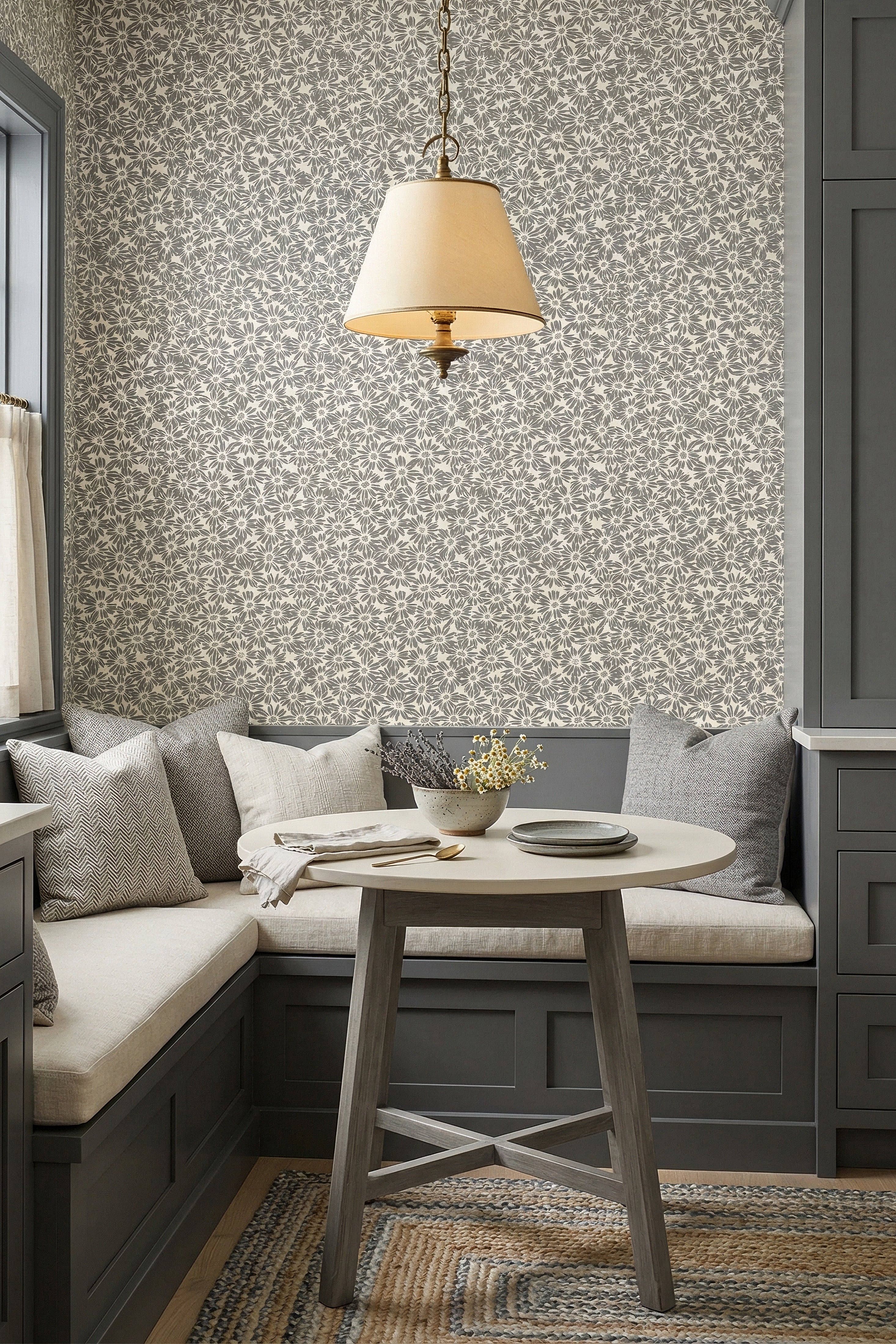 Dove Daisy wallpaper shown in a cozy nook