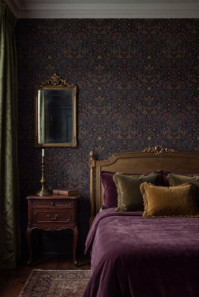 Midnight Aviary wallpaper shown in a bedroom