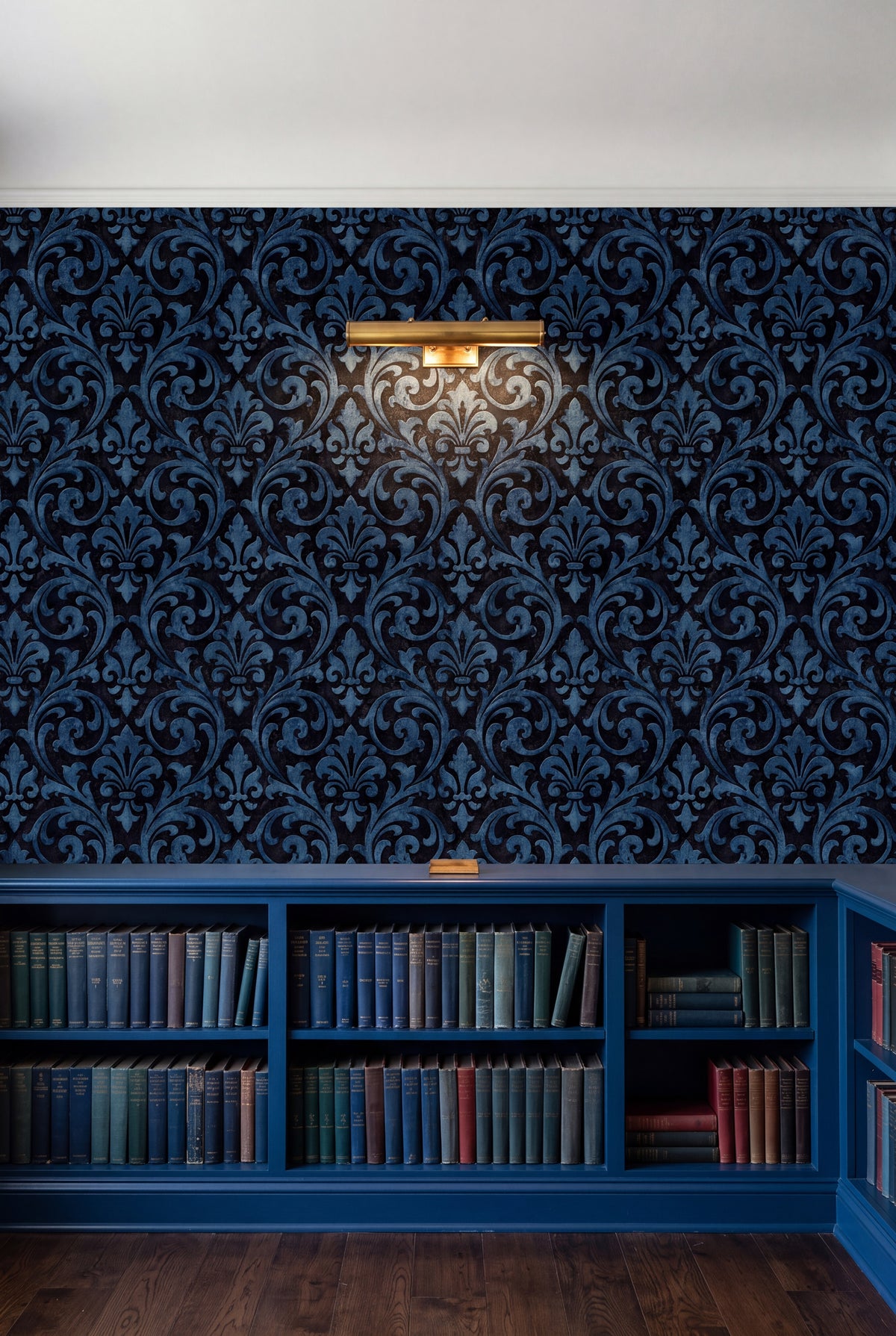 Cobalt Scrollwork wallpaper shown in a library