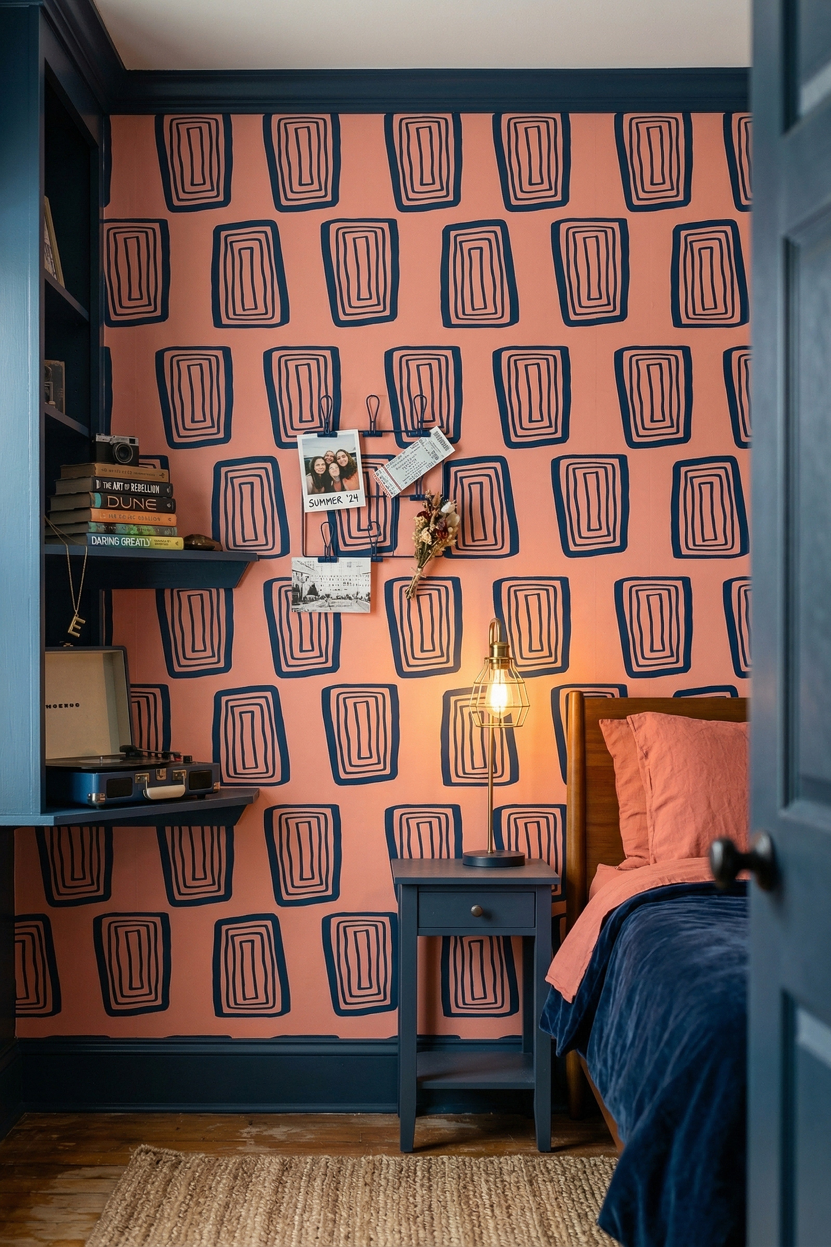 Coral Groove wallpaper shown in a bedroom