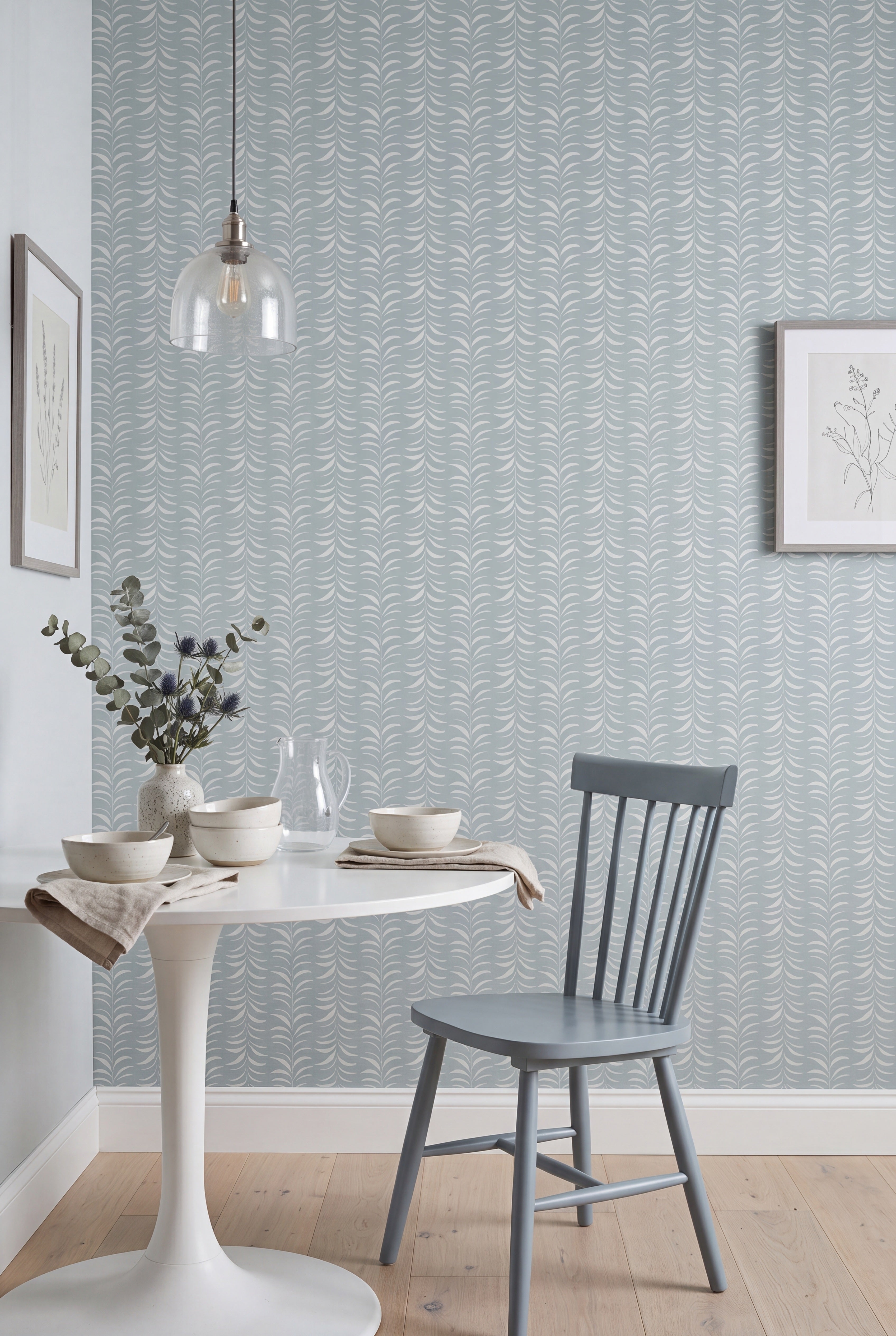 Pistachio Stripe wallpaper shown in a cozy nook