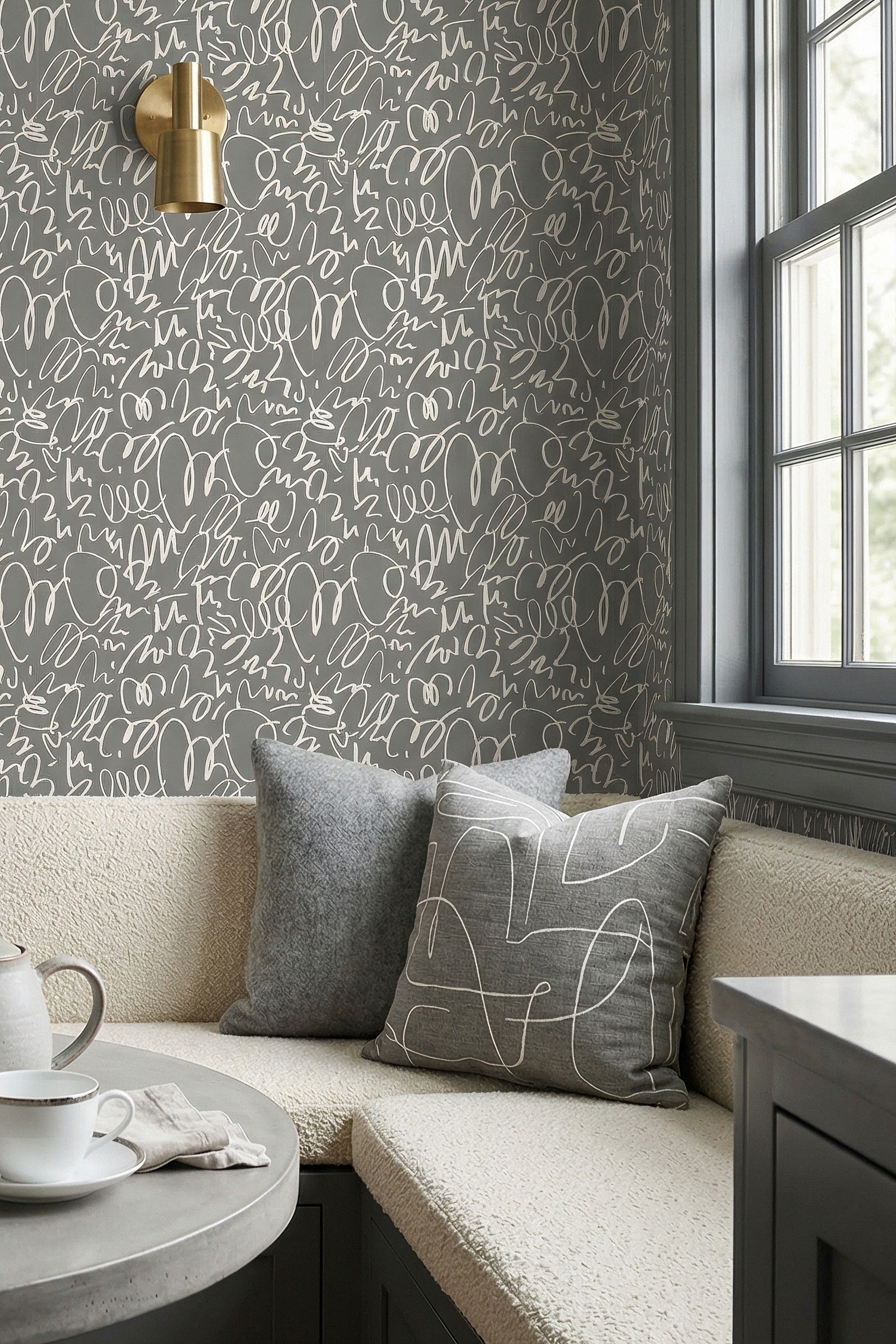 Graphite Doodle wallpaper shown in a cozy nook