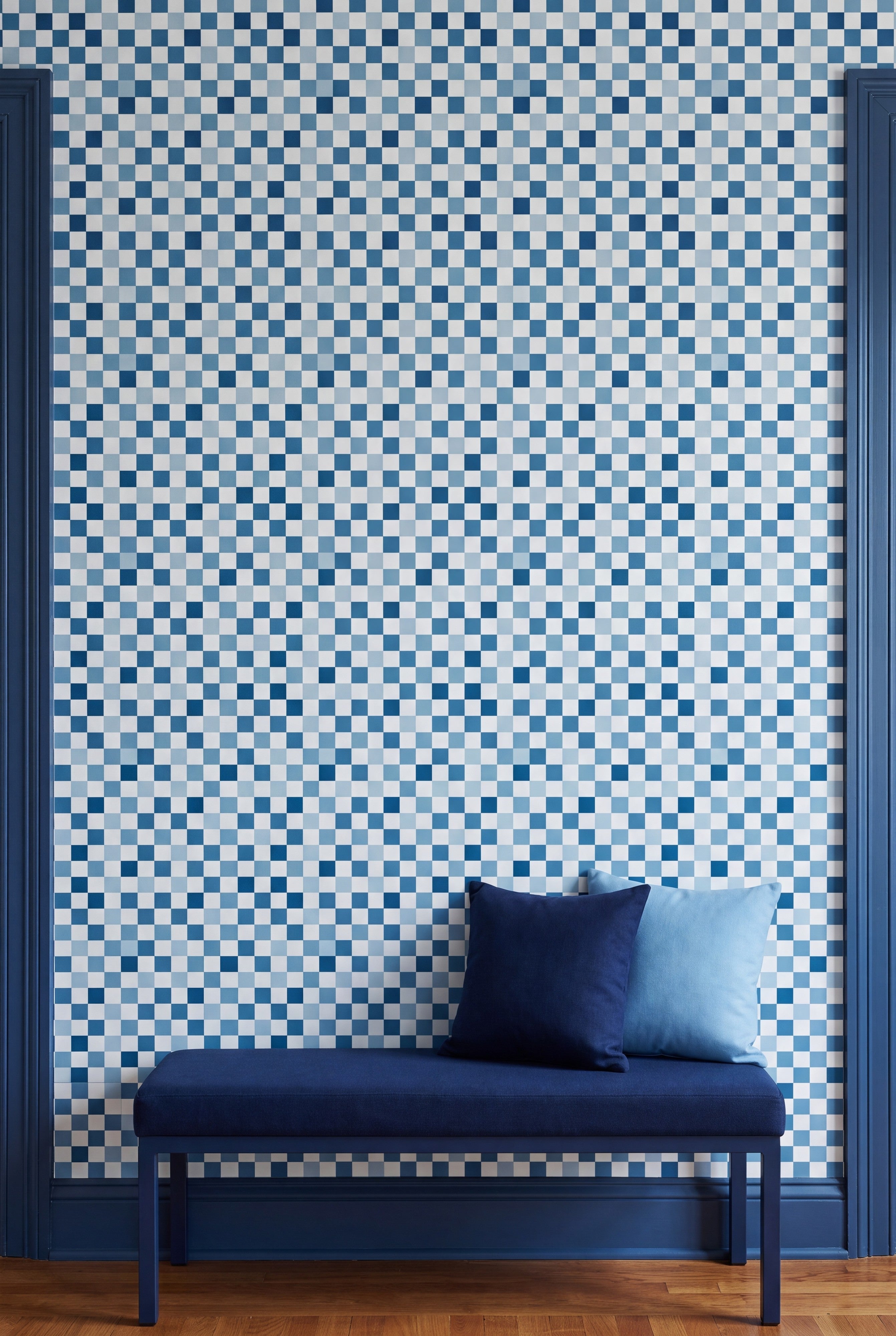 Blueberry Check wallpaper shown on an accent wall