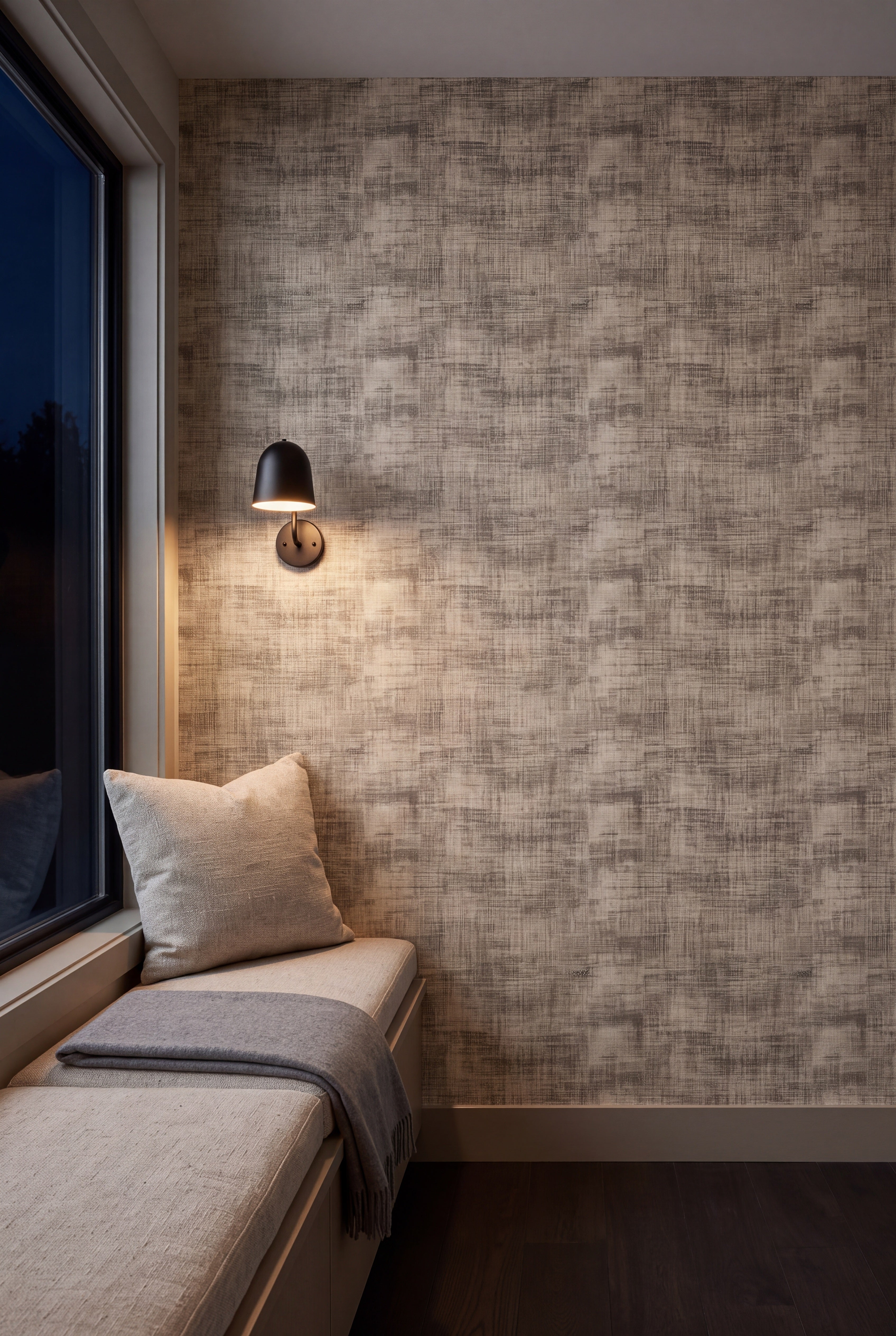 Plaster Drift wallpaper shown in a window seat alcove