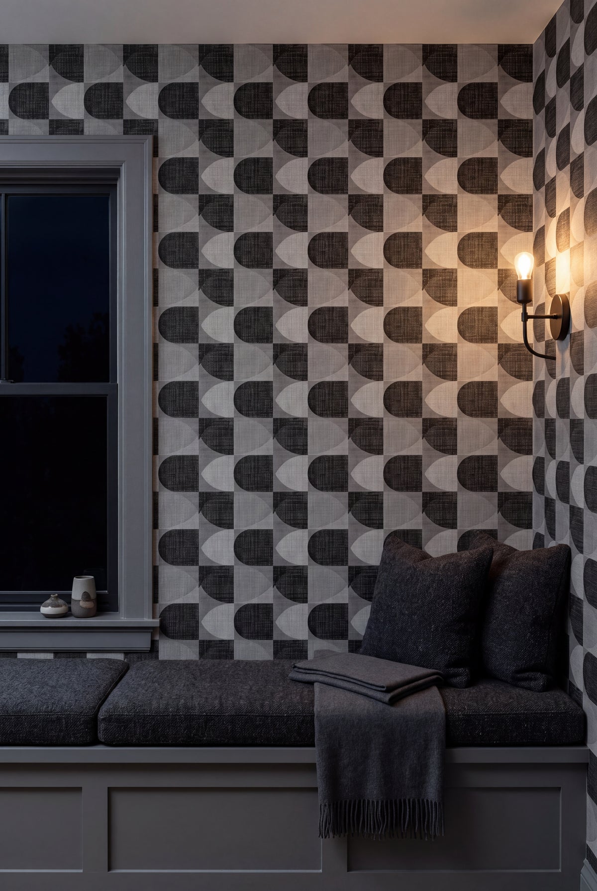 Domino Arc wallpaper shown in a window seat alcove
