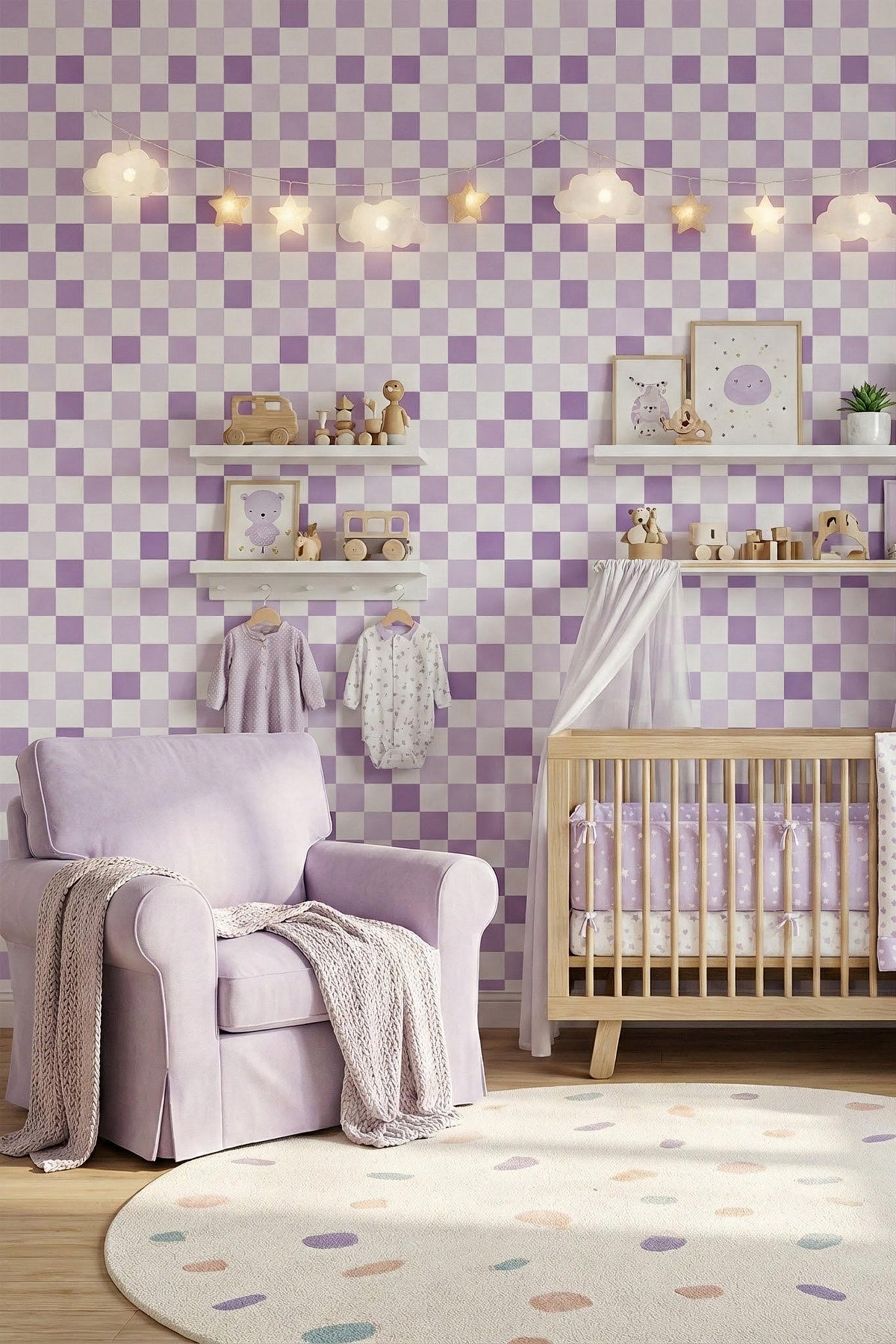 A styled baby nursery featuring lavender and white checkered wallpaper, a light purple armchair with a knit throw, a wooden crib with matching bedding, and a round multicolor polka-dot rug.
